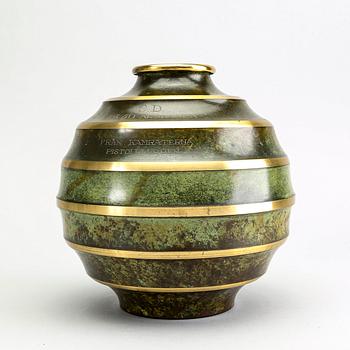 A Swedish Art Deco metal vase.