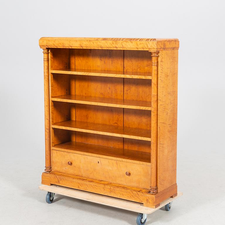 A birch Empire style early 1900s book shelf.