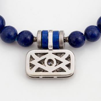 A Gaudy clasp and two necklaces.