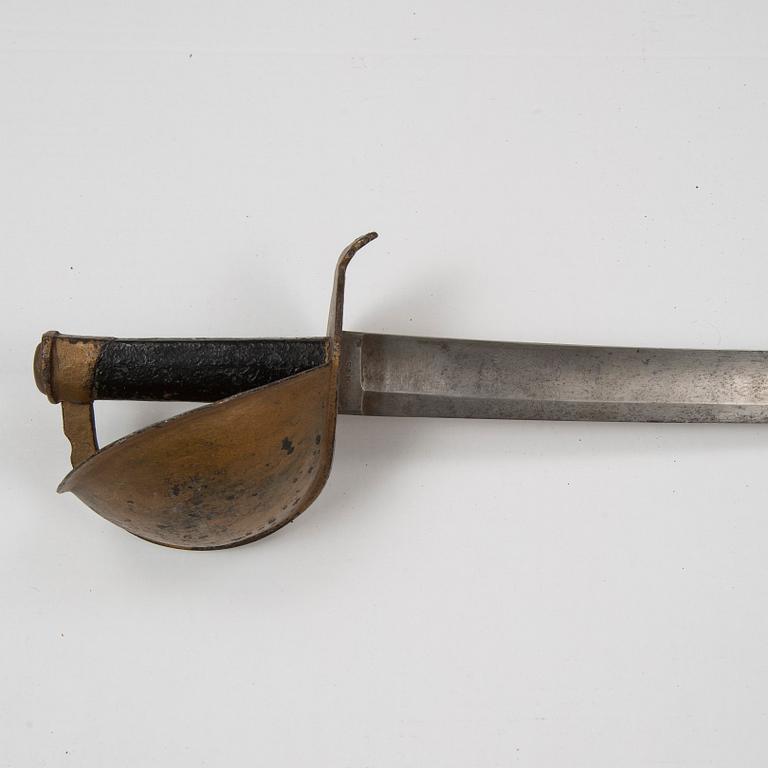 A Imperial German Navy cutlass with scabbard.