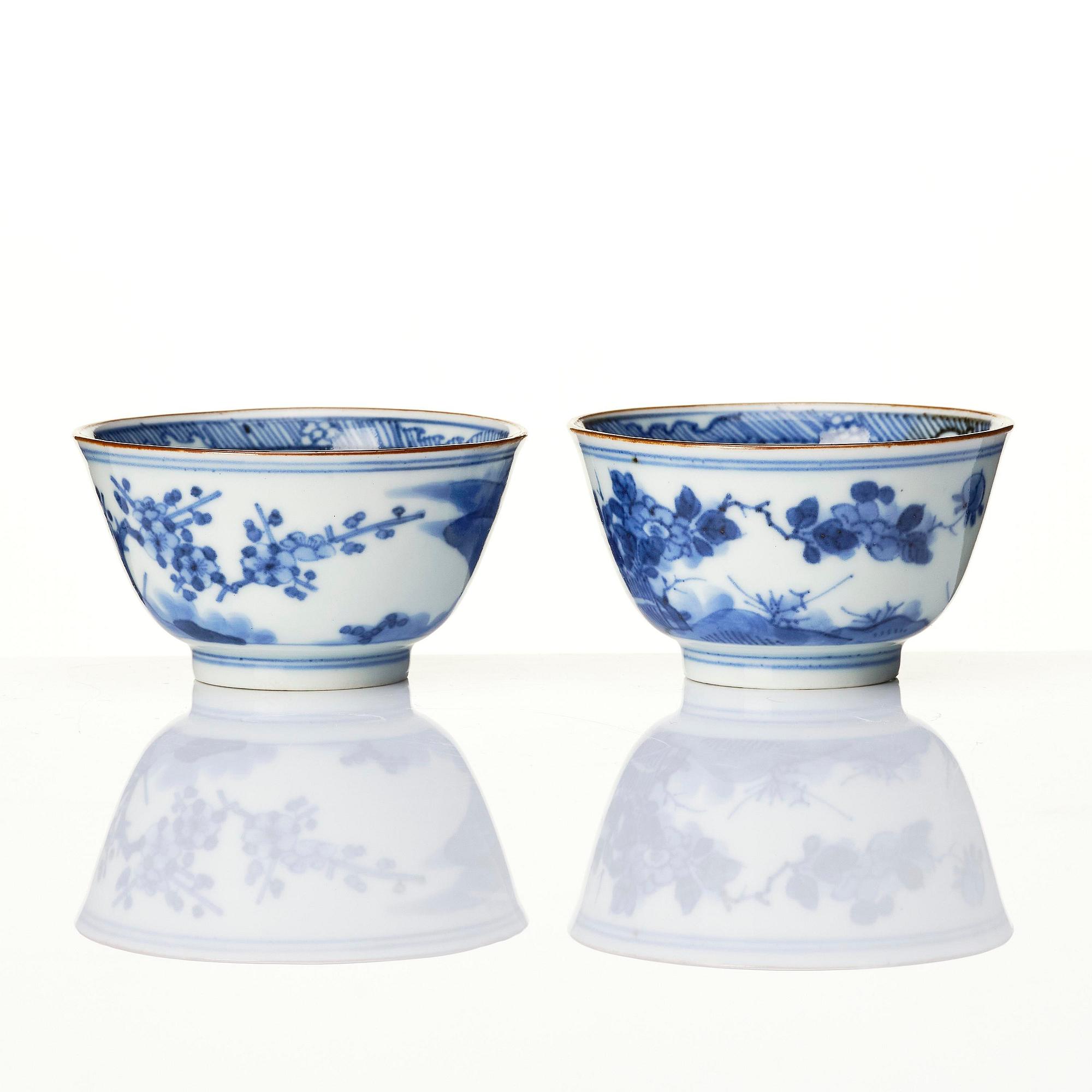 A matched set of eight blue and white cups and stands, Qing dynasty, Kangxi (1662-1722).