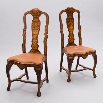 A pair of Dutch 19th Century chairs with inlays.