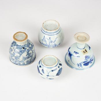 Two blue and white stemcups and two miniature jars, Ming dynasty (1368-1644).