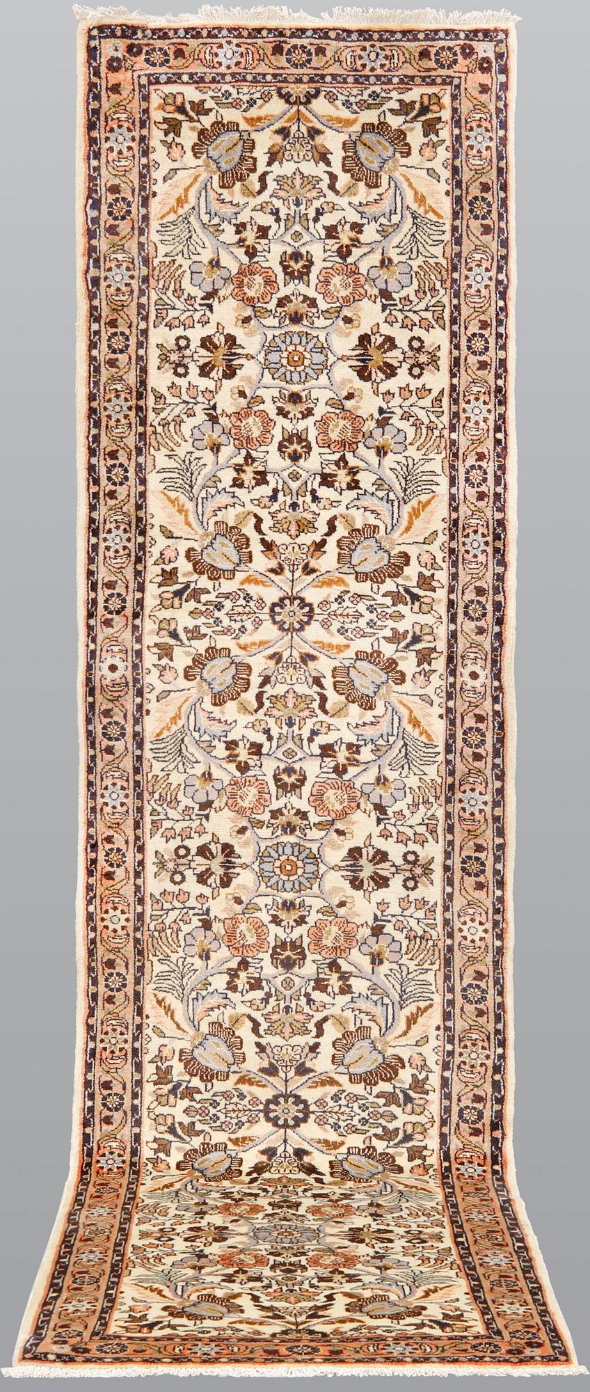 A Hamadan runner, ca 300 x 77 cm.