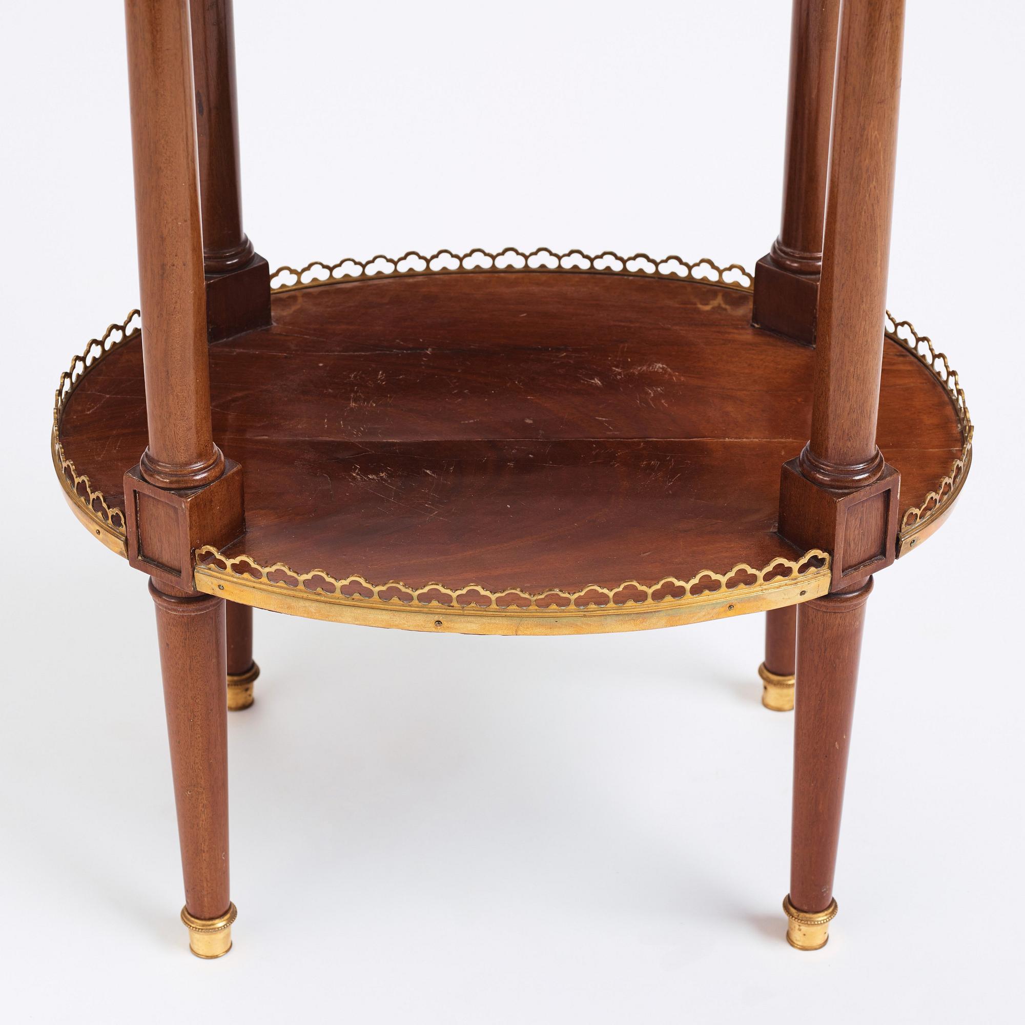 A Louis XVI mahogany and ormolu-mounted table signed Roger Vandercruse Lacroix 'RVLC' (master in Paris 1755-1799).