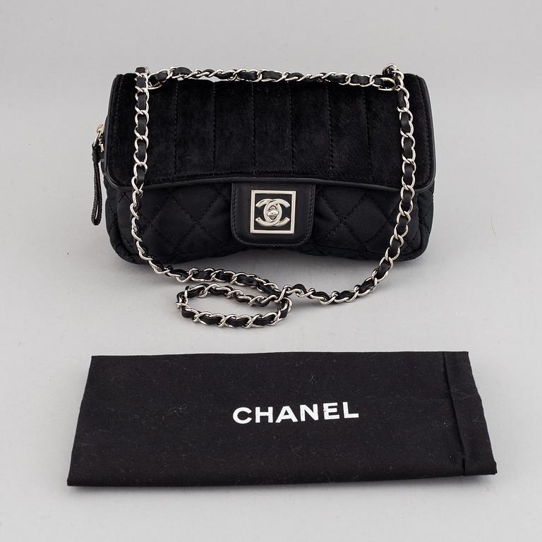 Chanel, a canvas and pony hair handbag, 2005-06.