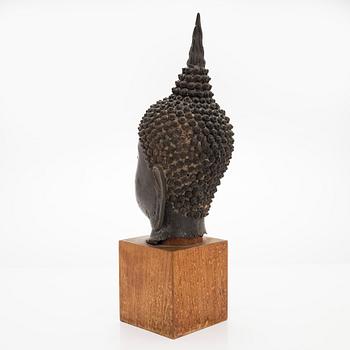 A patinated metal sculpture from Thailand, 20th century.