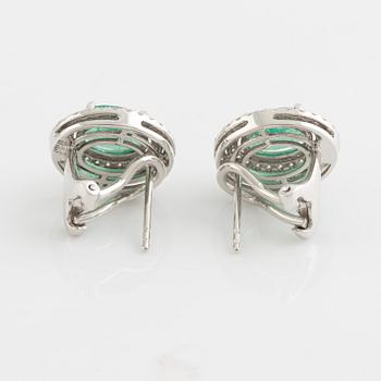 Emerald and brilliant cut diamond earrings.