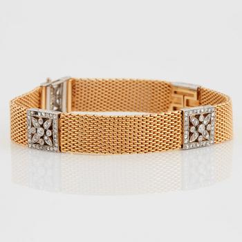 Armband 18K guld med motiv i platina med gammal- och rosenslipade diamanter.