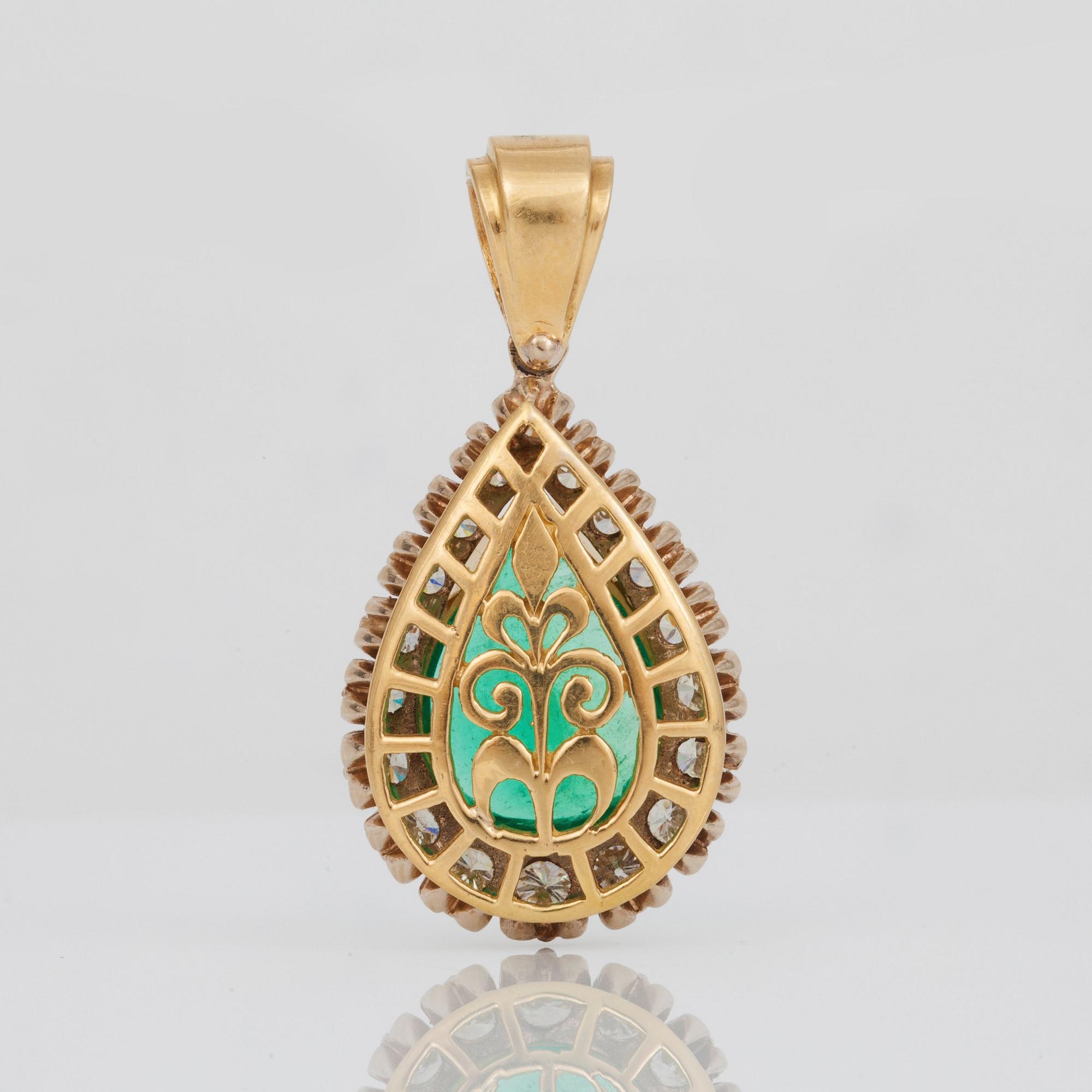 An emerald, circa 10 cts, and diamond, in total circa 2 cts, pendant.