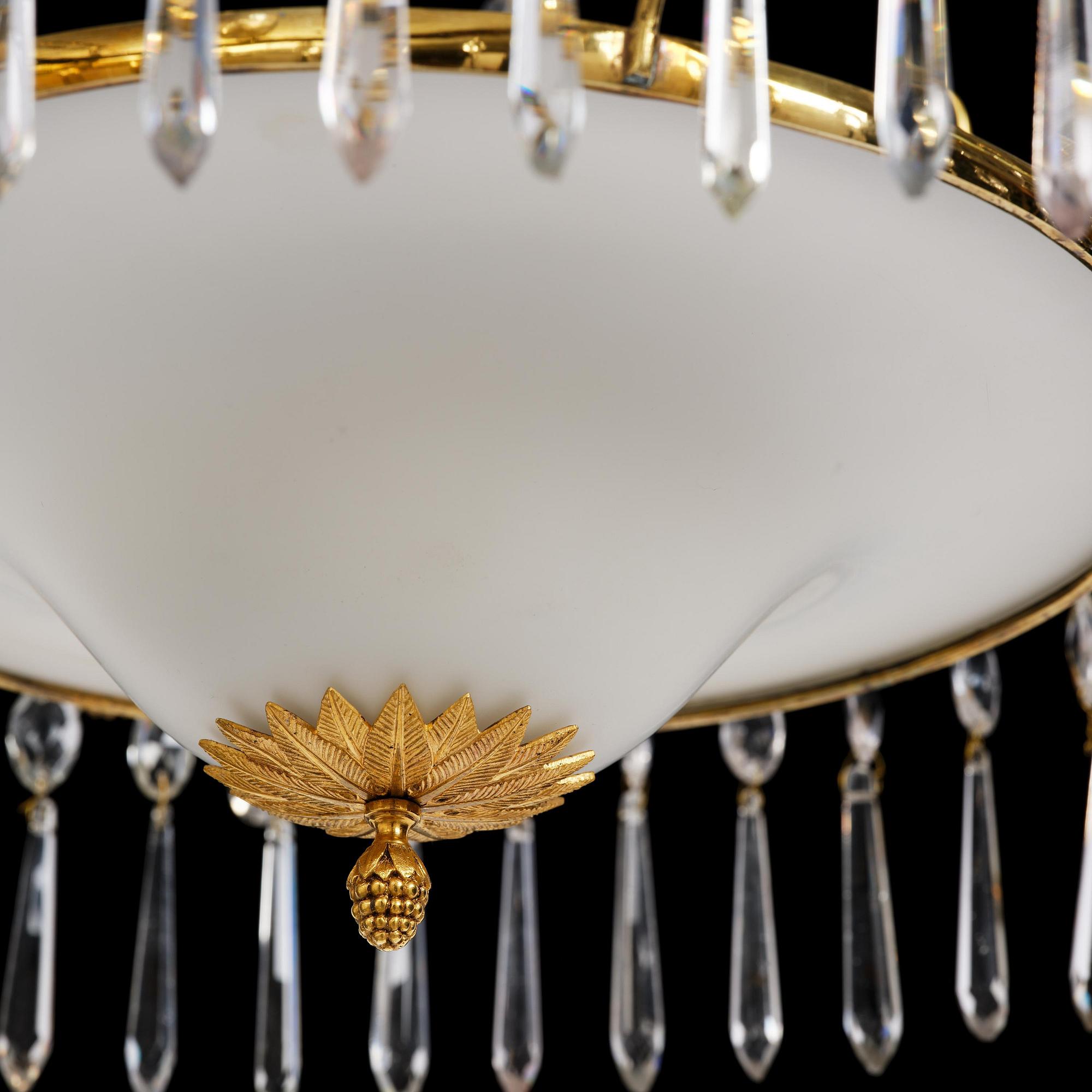 A late Gustavian gilt brass and cut glass four-light chandelier, Stockholm, late 18th century.