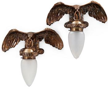 A pair of Art Nouveau patinated brass wall-lights, attributed to Alice Nordin, Böhlmarks, Stockholm, 1910's-20's.