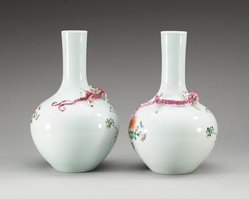 A pair of famille rose vases, first half of 20th Century, with Hongxian four character mark in red.