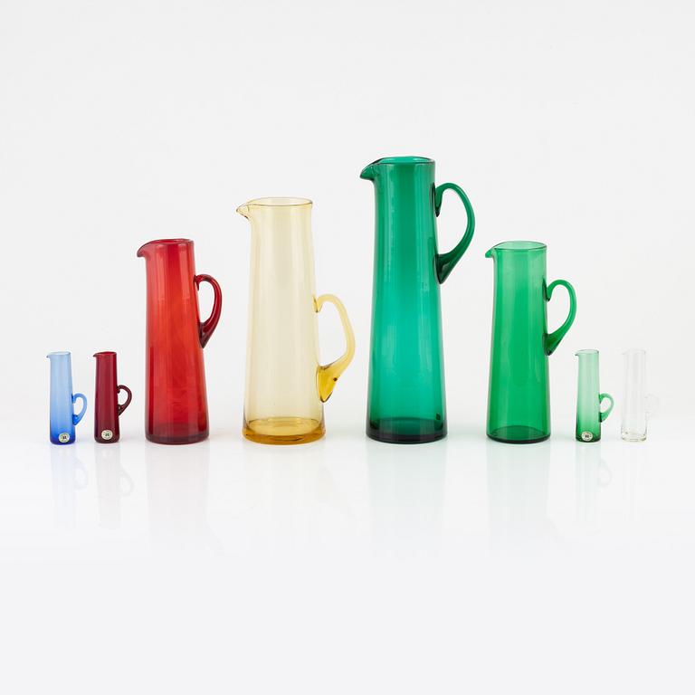 Eight glass jugs, Reijmyre, Sweden, second half of the 20th century.