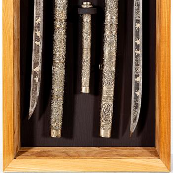 A set of three Burmese 'Dha' swords, late 19th /early 20th Century.