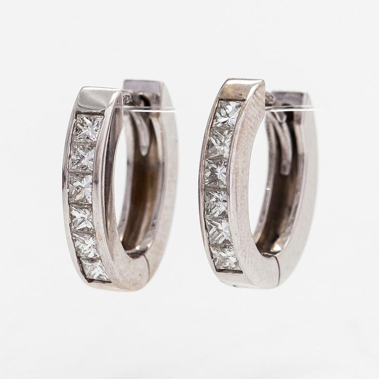 A pair of 18K white gold earrings, with diamonds totaling approx. 0.62 ct. Lanza Carlo, Italy.