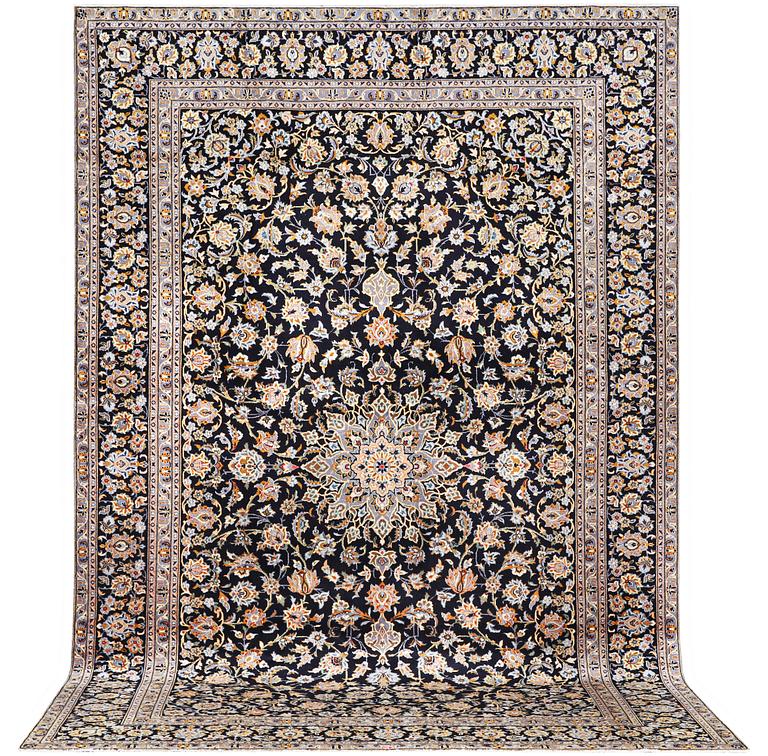 A Kashan carpet, c. 410 x 270 cm.