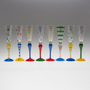 A set of eight Orrefors "Clown" glass champagne flutes design Anne Nilsson.