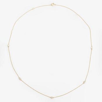 A 14K gold necklace with diamonds ca. 0.15 ct in total.