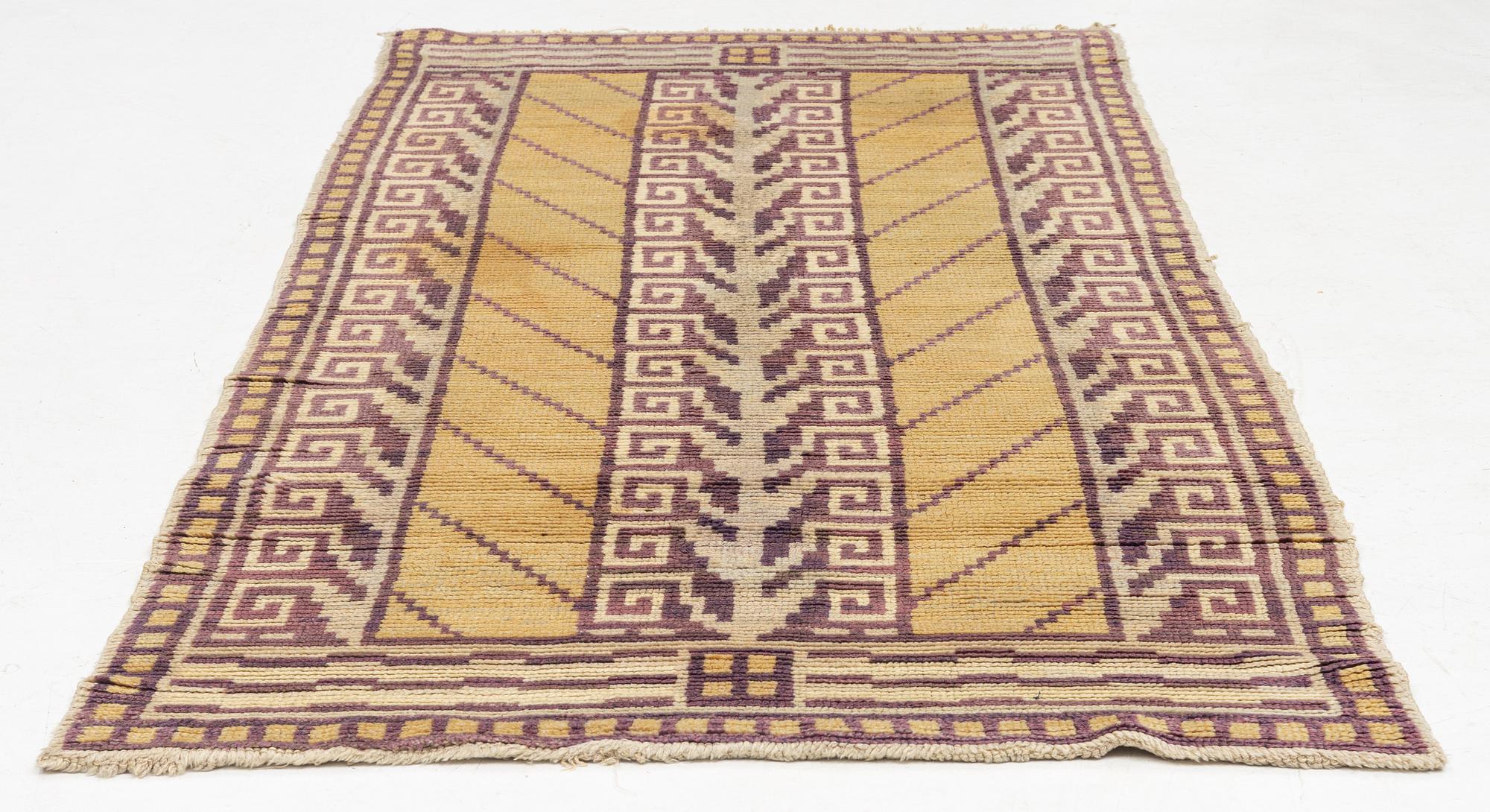 An Art Déco Pile Rug, 1930s. Circa 237 x 112 cm.