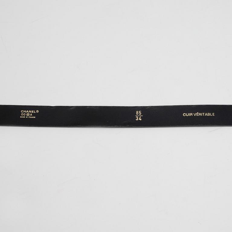 GUCCI and CHANEL, three leather belts.