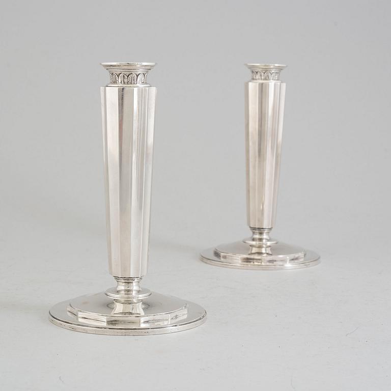 A pair of sterling silver candle sticks by Atelier Borgila. Stockholm 1956.