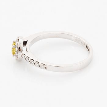 Yellow colour treated diamond and brilliant-cut diamond ring.