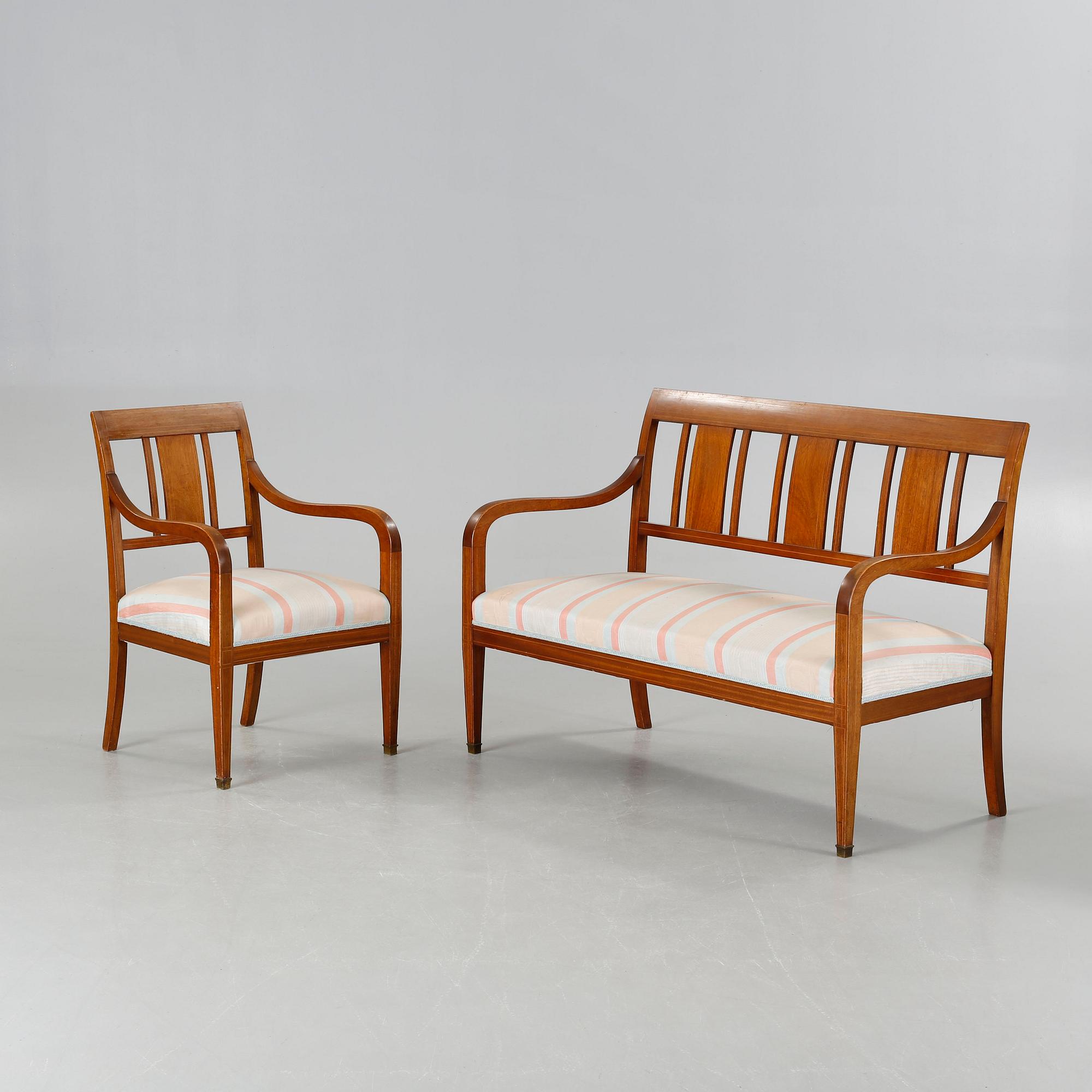 A sofa, six chairs and one table in Swedish Karl-Johan style, made in the first half of the 20th century.