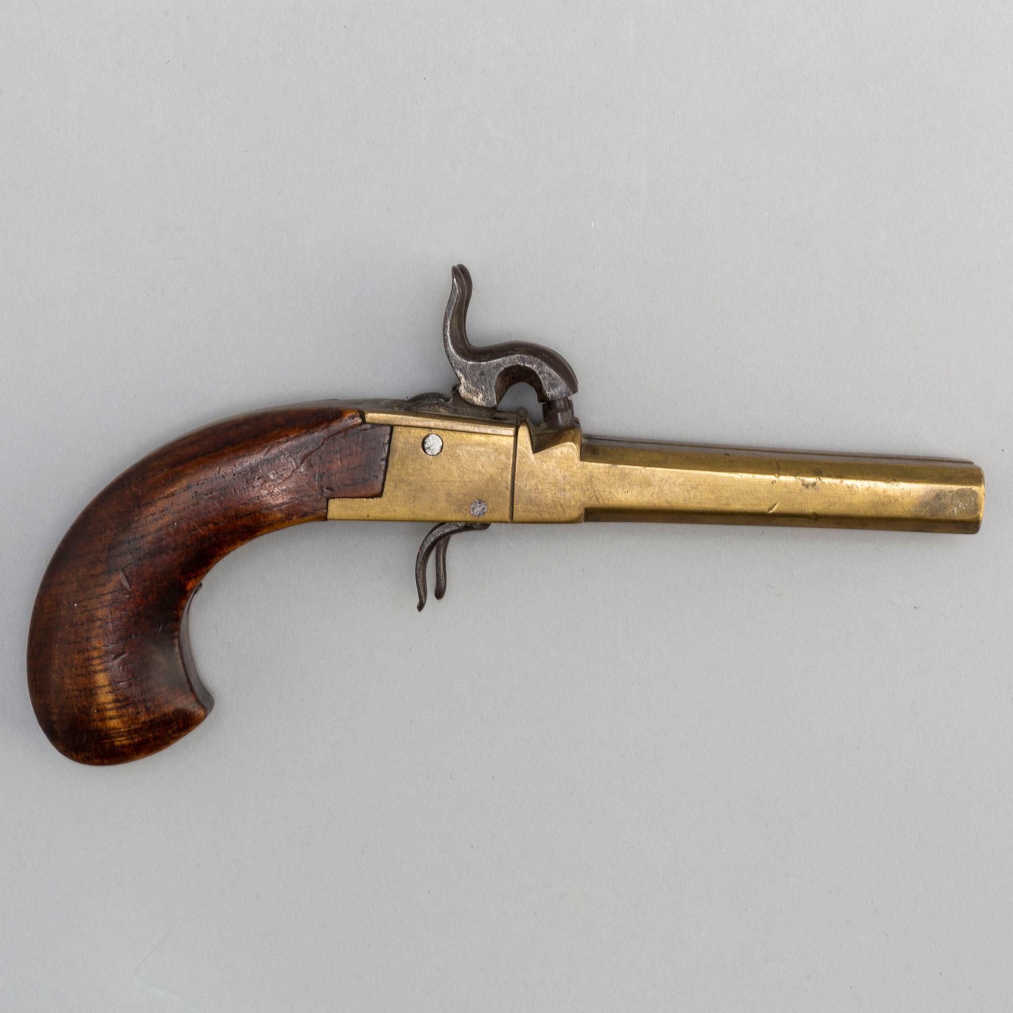 One revolver and one percussion gun, second half of the 19th century.