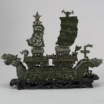 A large Chinese green stone carved sculpture, 20th century.