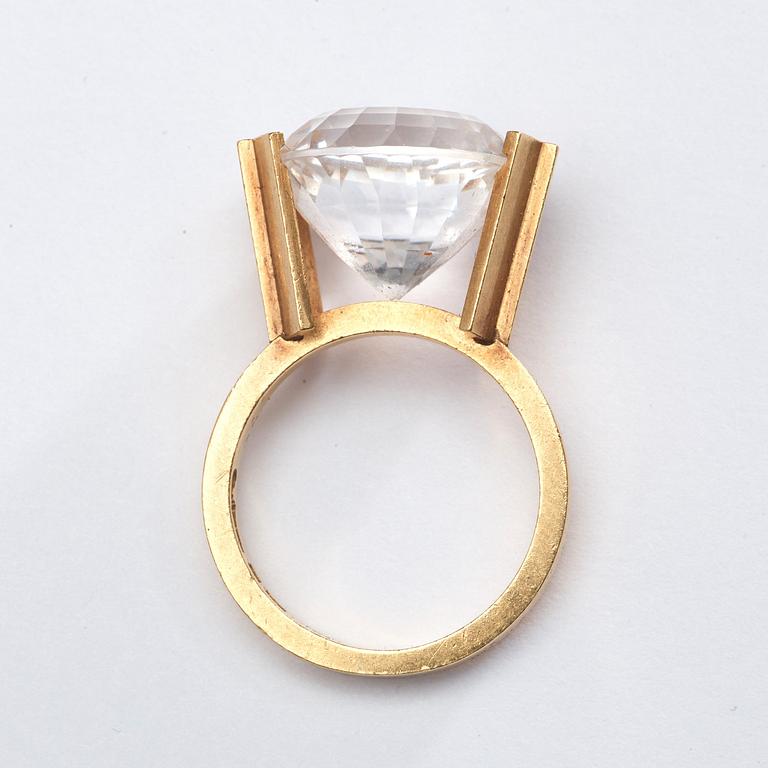 Wiwen Nilsson, a 18k gold ring with a facet cut rock crystal, Lund 1972.