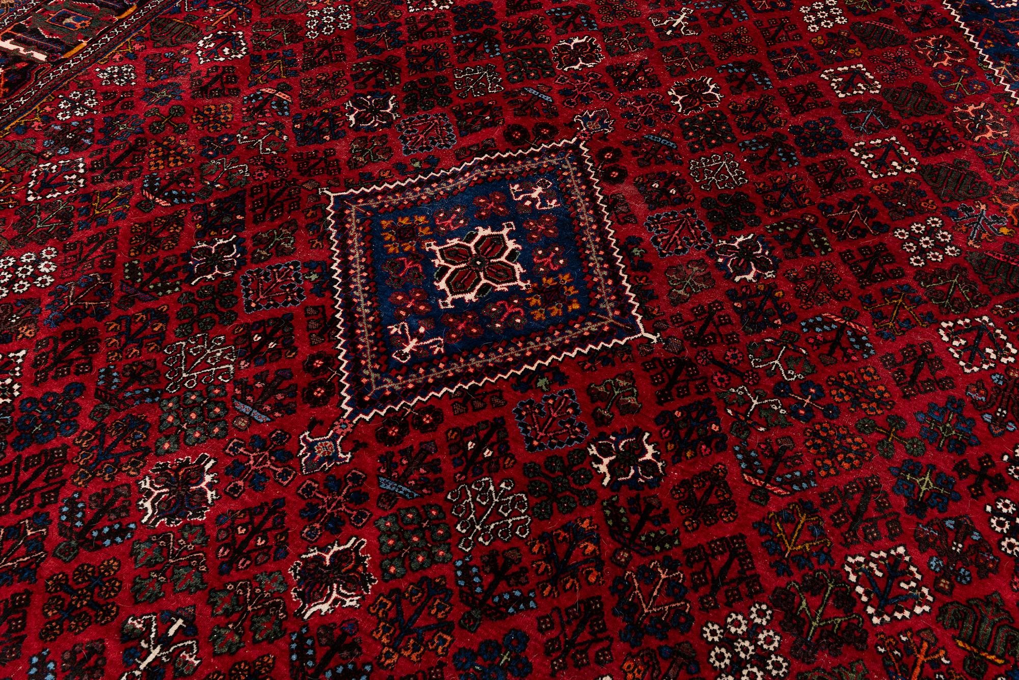 An oriental rug, c. 365 x 285 cm.