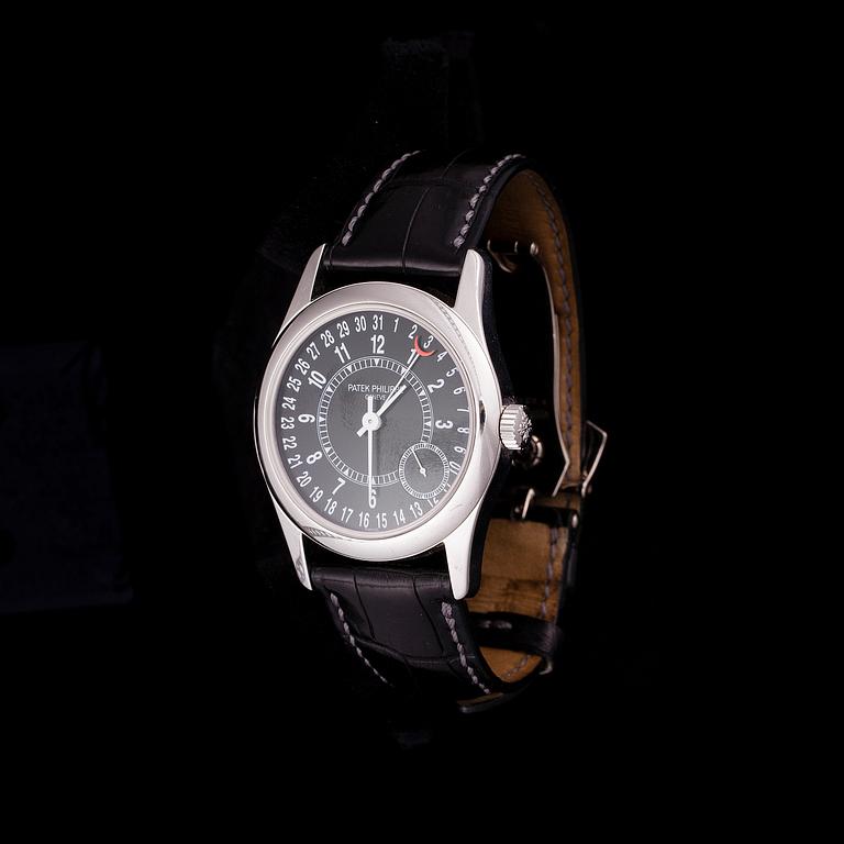 ARMBANSDUR, herr, Patek Philippe, 18K vitguld, original läderarmband. Certifikat, box. 2005.