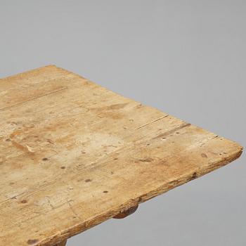 A pine trestle table, 20th century incorporating older elements.