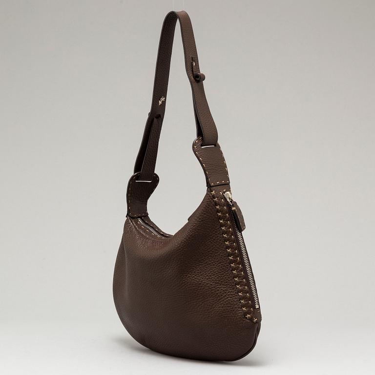 FENDI, a brown leather bag.