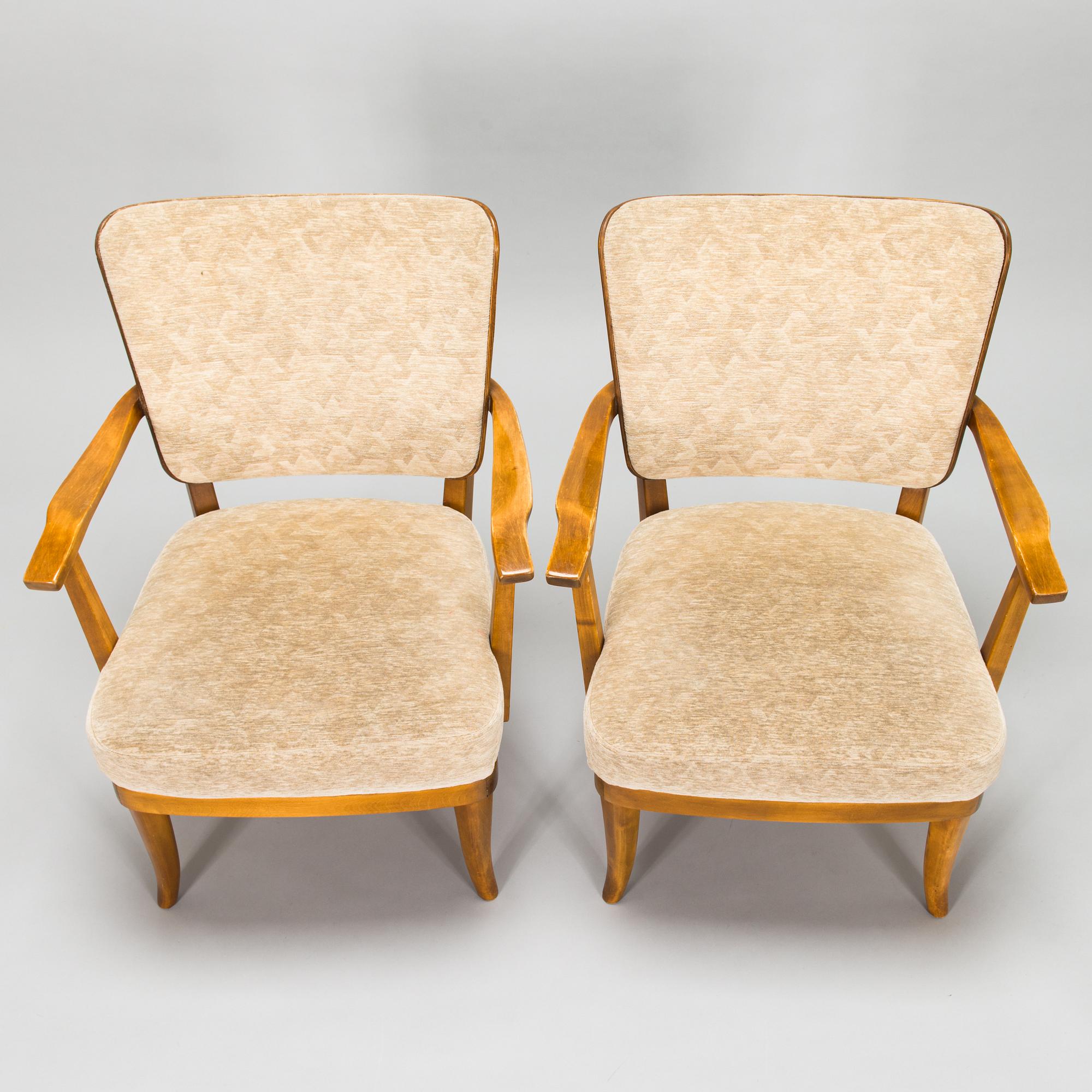 Einari Kyöstilä, a pair of 1940s open armchairs for Oy Stockmann Ab, Keravan Puusepäntehdas, Finland.