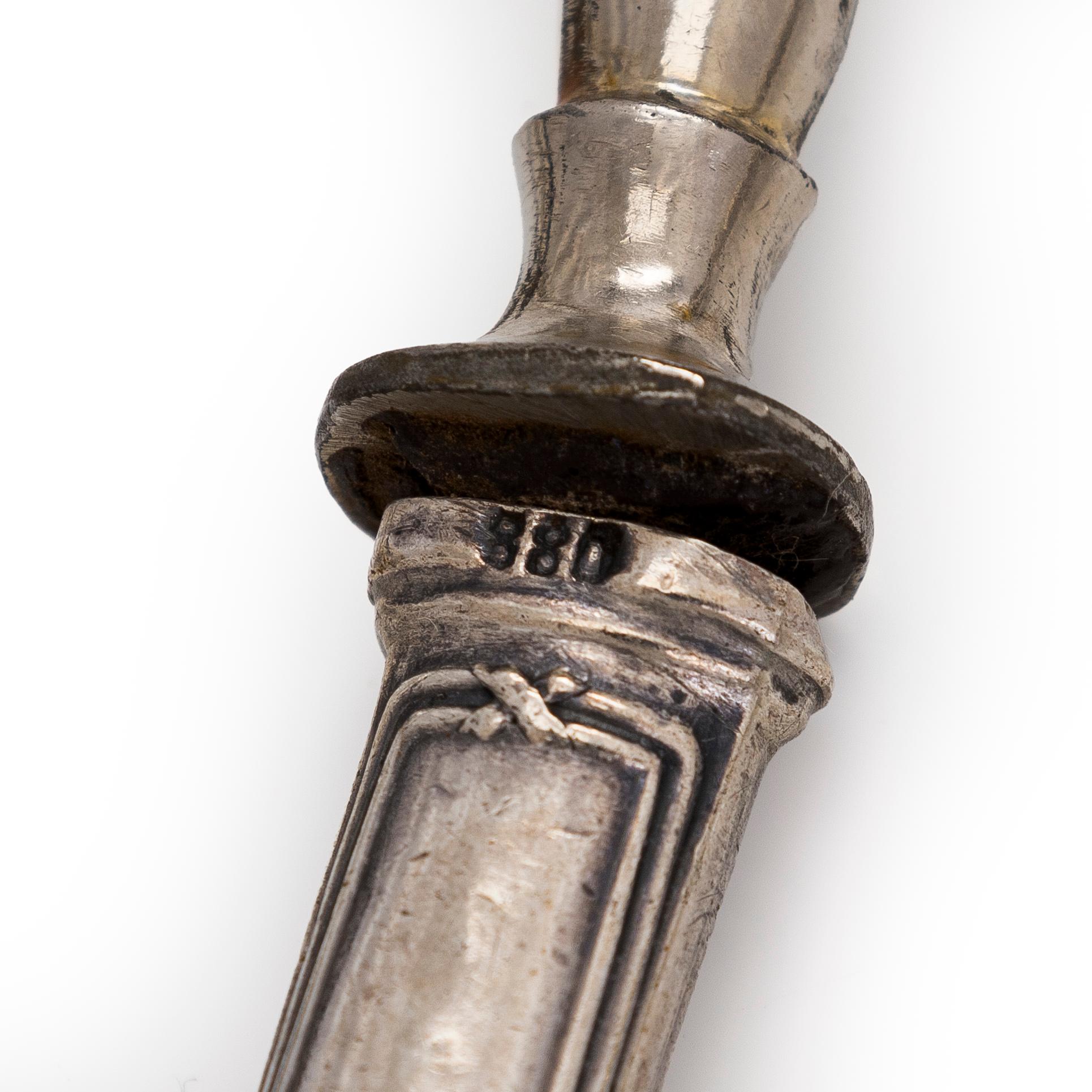 A 16-piece set of serving cutlery, silver handles with steel blades, Russian import marks, Riga 1908-1926.