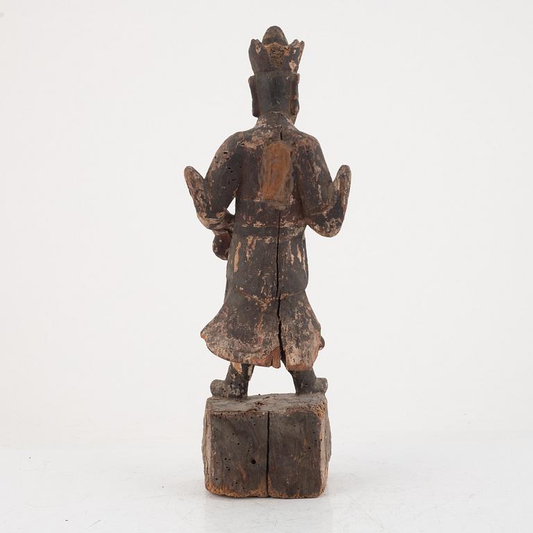 A Chinese wooden gardian figure, Qing dynasty.