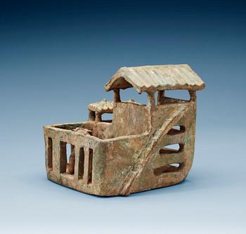 1601. A green glazed pottery model of a house, Han dynasty (206 BC-220 AD).