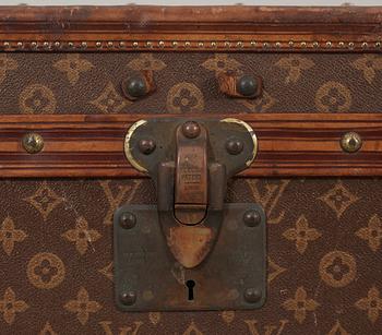 An early 20th cent monogram canvas trunk by Louis Vuitton.