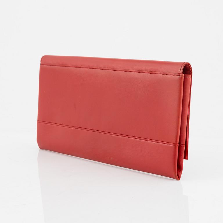 Christian Dior, a red box calf leather clutch.