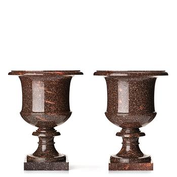 121. A pair if Swedish porphyry urns, late Gusavian early 19th century.