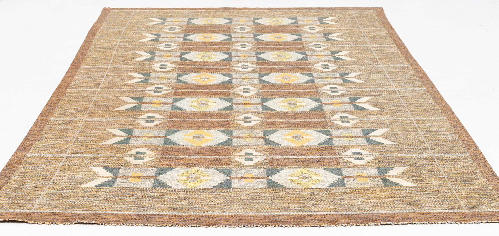 Ingegerd Silow, a carpet, flat weave, c 345 x 225 cm, signed IS.