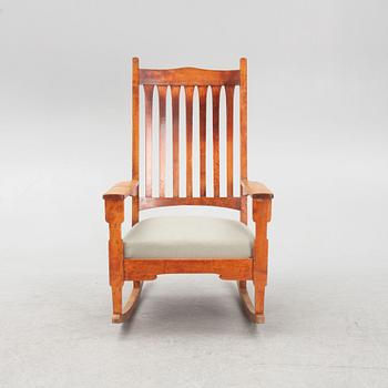 Gustav Stickley, after. A 'Bungalow Rocker' rocking chair, early 20th Century.