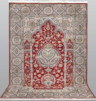 A part silk Nain rug, so-called 6 LAA, signed, approx. 256 x 165 cm.