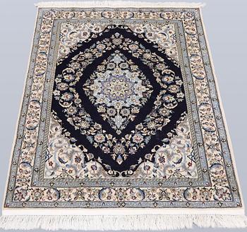 A Nain rug, part silk, so-called 6 LAA, approx. 126 x 93 cm.