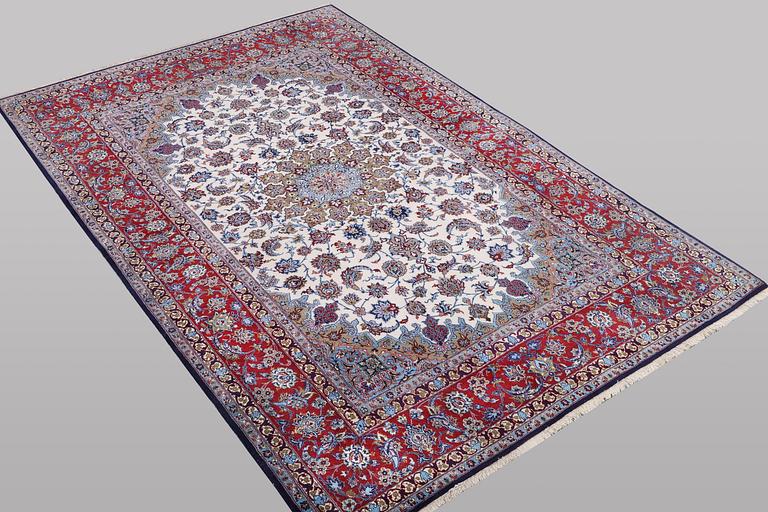 A rug, Esfahan, silk warp and part silk pile, ca 245 x 155 cm.