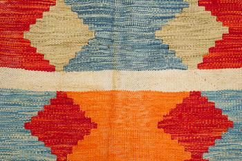 A kilim carpet, c 308 x 194 cm.