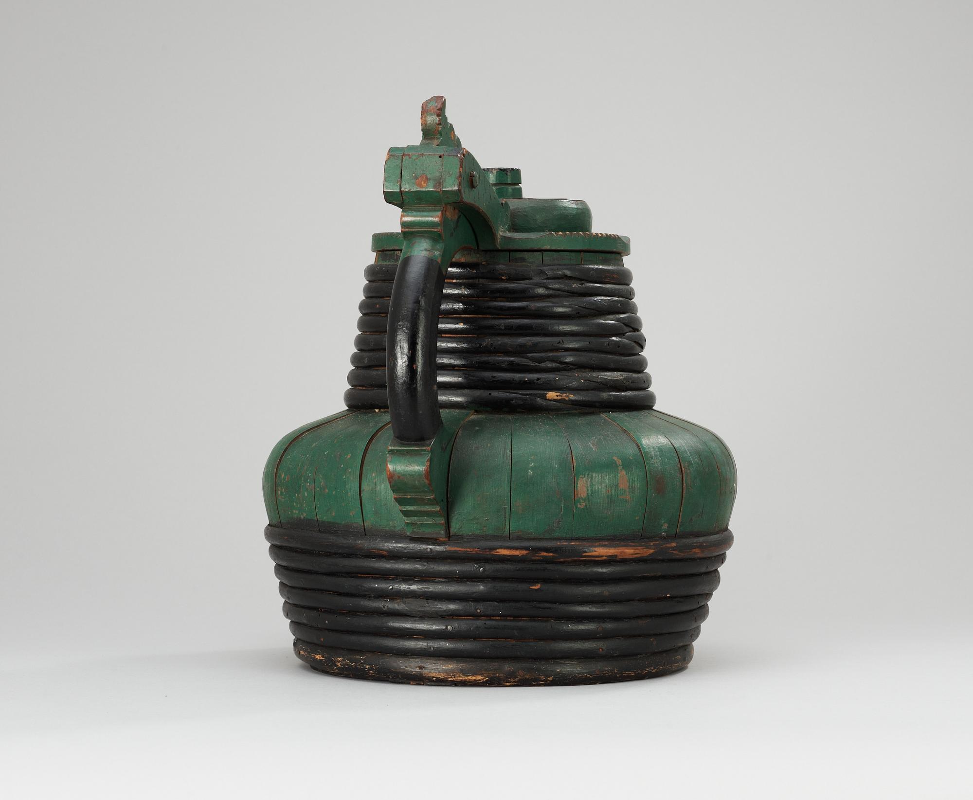 A Norweigan 19th century wood jug.