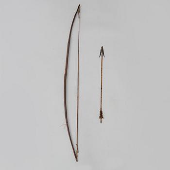 A 19th/20th century south-east asian bow with an arrow.